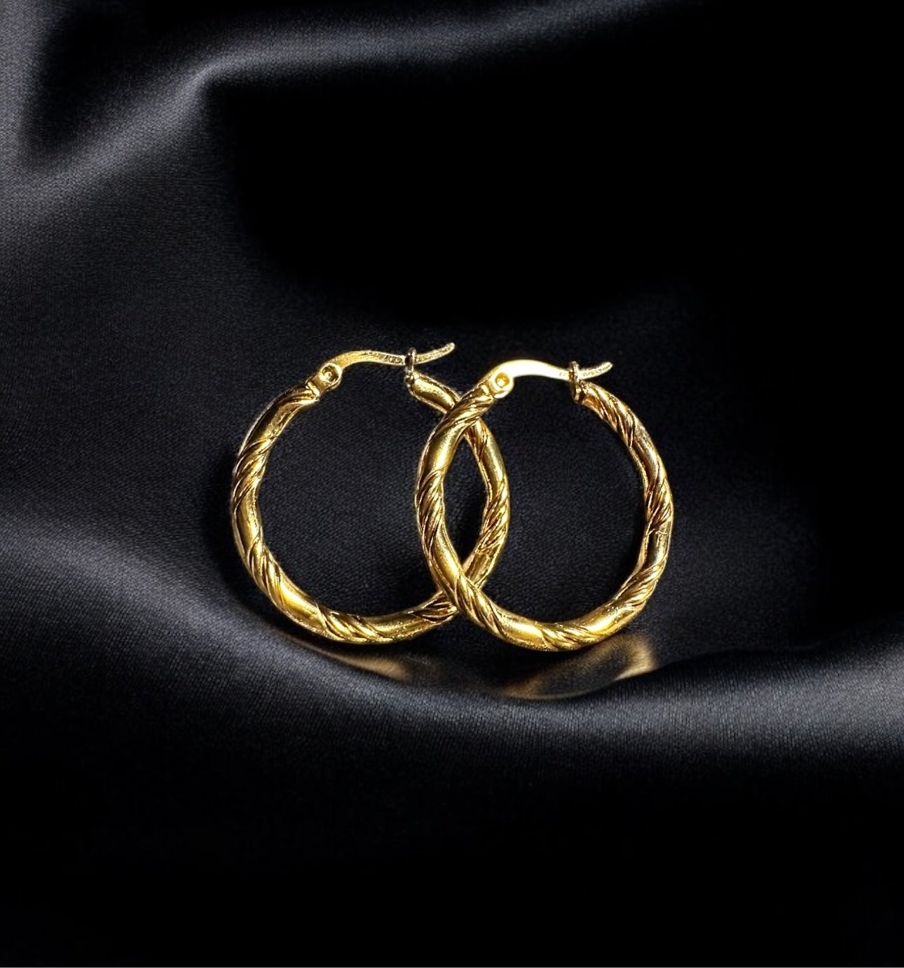 Sculpted twist hoops