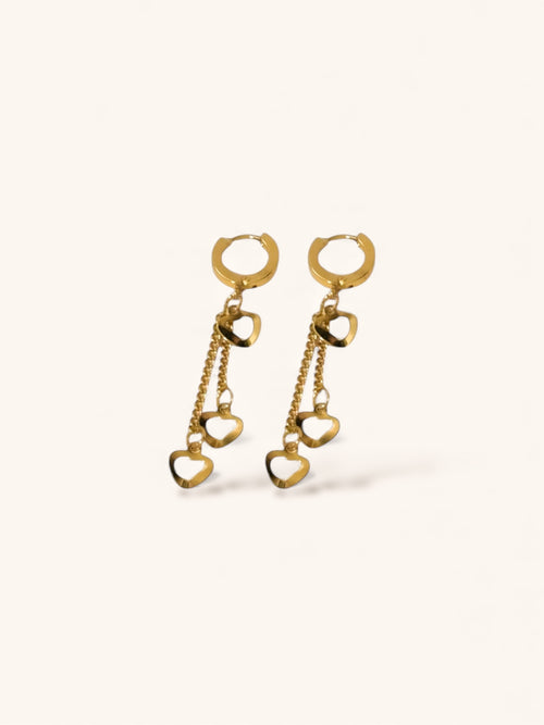 “Minimalist gold heart drop earrings for everyday wear”
