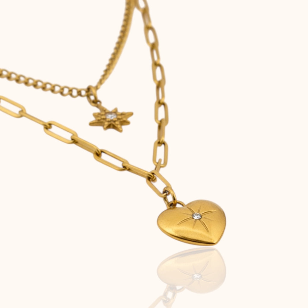 Celestia gold-plated necklace with shooting star and heart charms, mini zircon accents