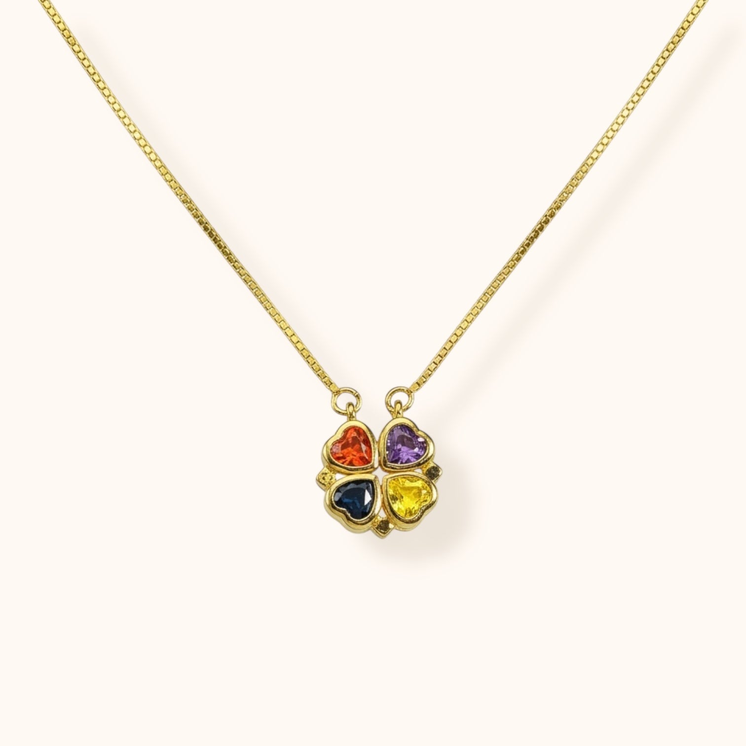 Colourful clover gold necklace close-up