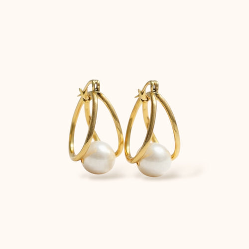 “Gold-plated minimalist pearl hoop earrings with cream vintage pearl drop”
