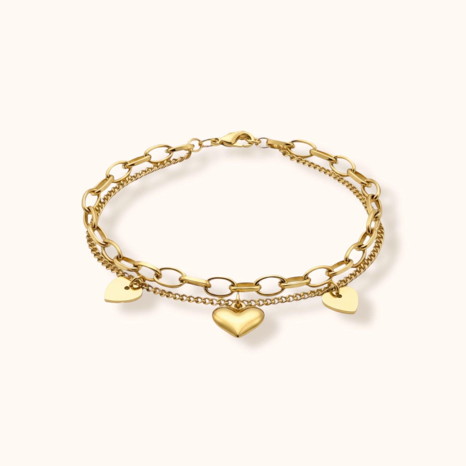Layered gold-plated bracelet with heart charms for everyday wear