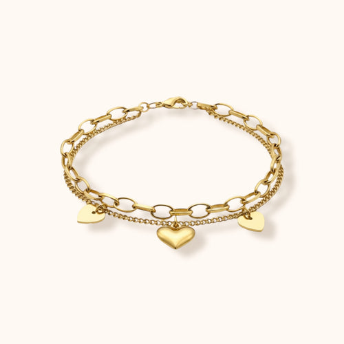 Layered gold-plated bracelet with heart charms for everyday wear