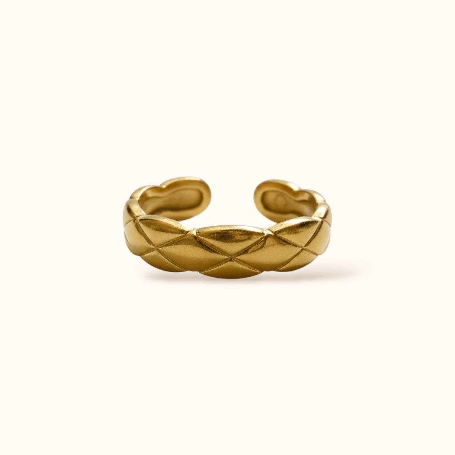 Minimalist open gold ring with modern cross texture
