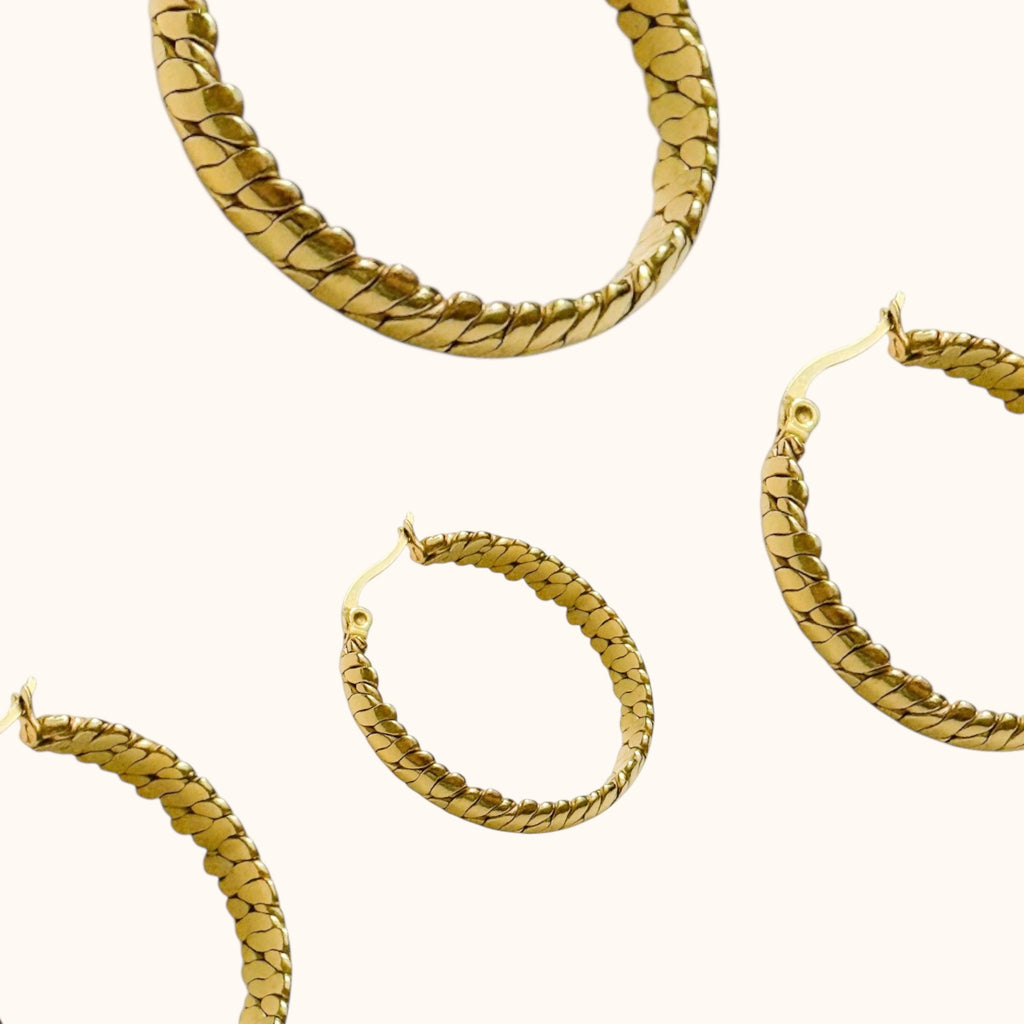 “Medium gold interlaced hoop earrings for everyday wear
