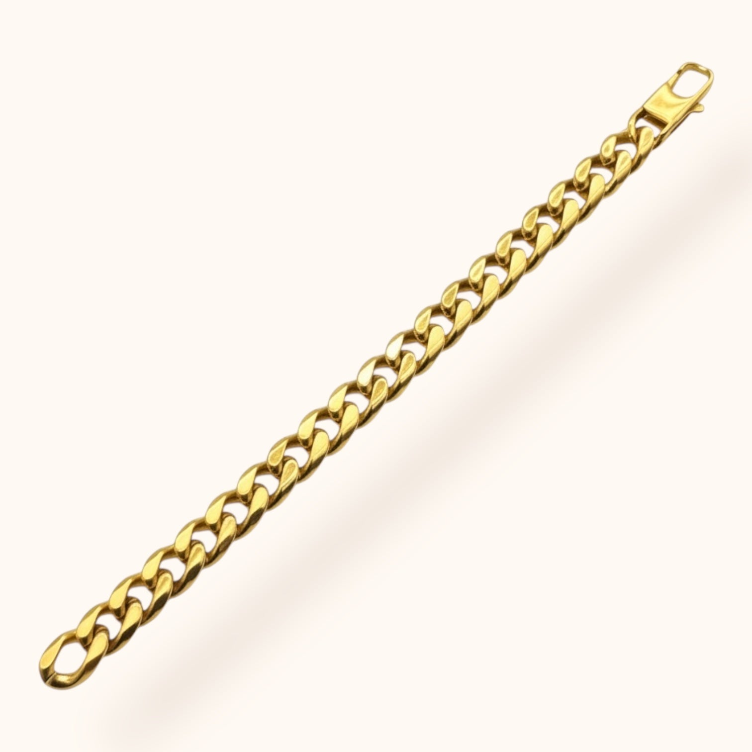 Minimalist gold chain bracelet on wrist