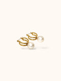 “Minimalist gold-plated pearl drop earrings for everyday wear”
