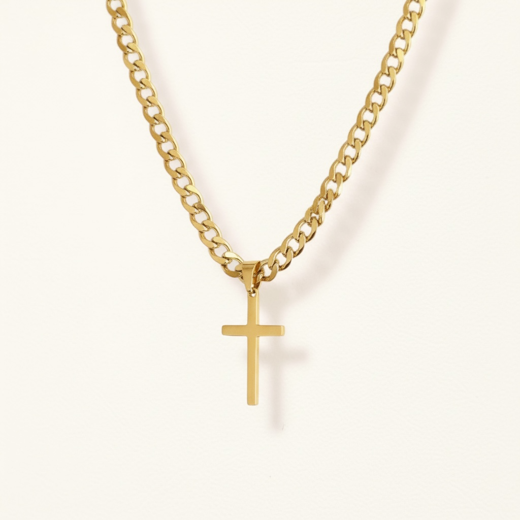 Gold chain necklace with a cross pendant on a white background