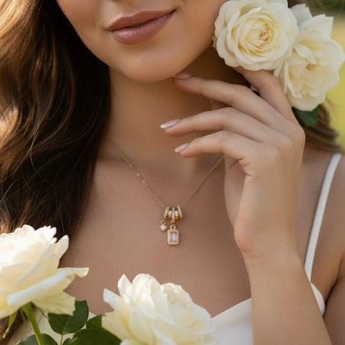 Woman holding white flowers with a blurred natural background